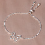 Pulsera de tenis mariposa brillante – Diseño hueco con diamantes de imitación