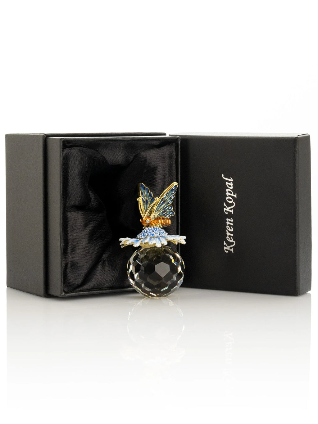Butterfly sitting on Flower and Crystal - World Gifts