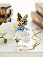 Butterfly sitting on Flower and Crystal - World Gifts