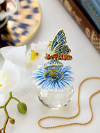 Butterfly sitting on Flower and Crystal - World Gifts